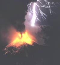 Lightning struck during the eruption of Mount Rinjani in Indonesia in 1995, by Oliver Spalt
